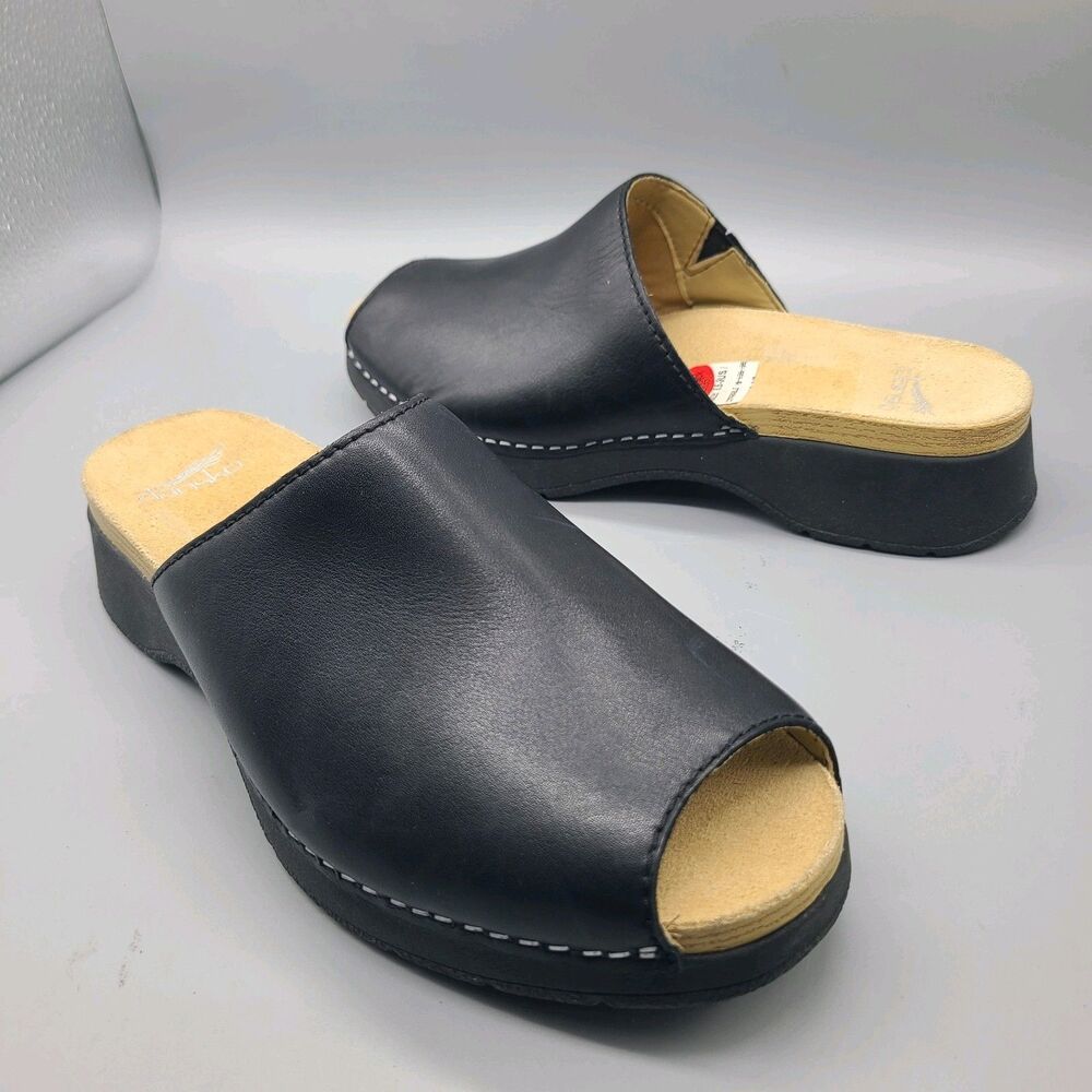 Dansko Black Leather Open-Toe Clogs
